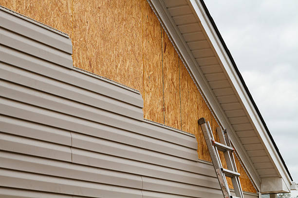 Professional Emergency Siding Repair technician working in Evans, GA